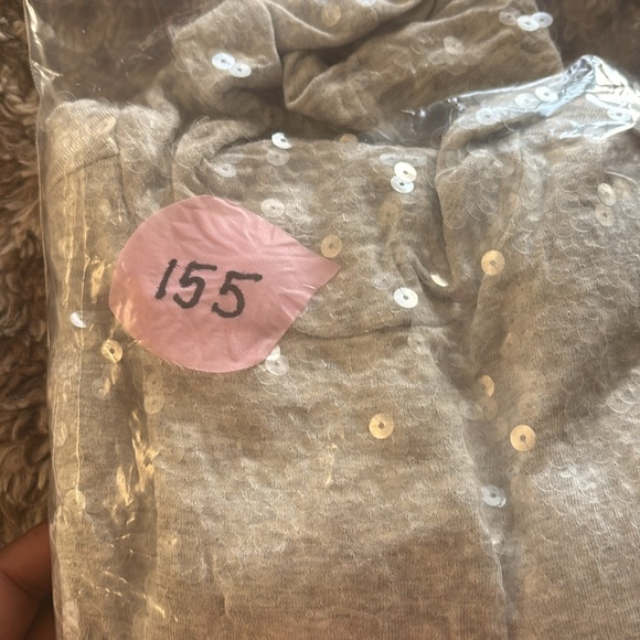 Elevate your wardrobe with our fitted light gray/silver turtleneck - Picture 4 of 4